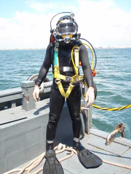 West Squadron commercial diver preparing to enter the water
