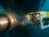 Underwater Tailshaft clearance measurements using ROV on commercial vessel propeller shaft to detect alignment issues and prevent propulsion failure.